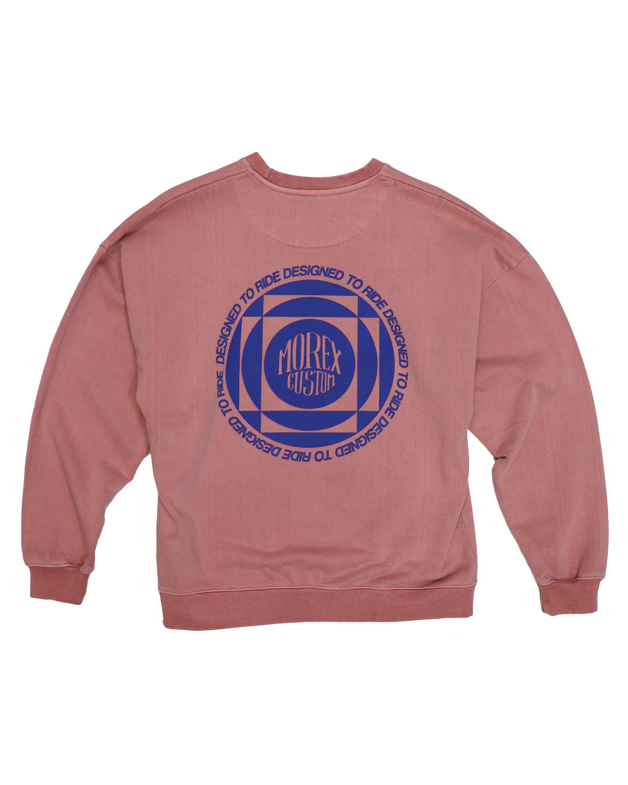 Sweat vintage oversize en coton épais 460GSM, couleur rose délavé avec épaules tombantes, manches amples et logo 'Designed to Ride' imprimé sur le cœur et dans le dos. Style inspiré des années 80 avec un effet vintage unique